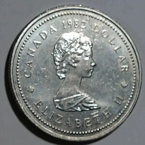 Queen Elizabeth ll British Genuine $1 Canada Genuine...we bundle..enjoy